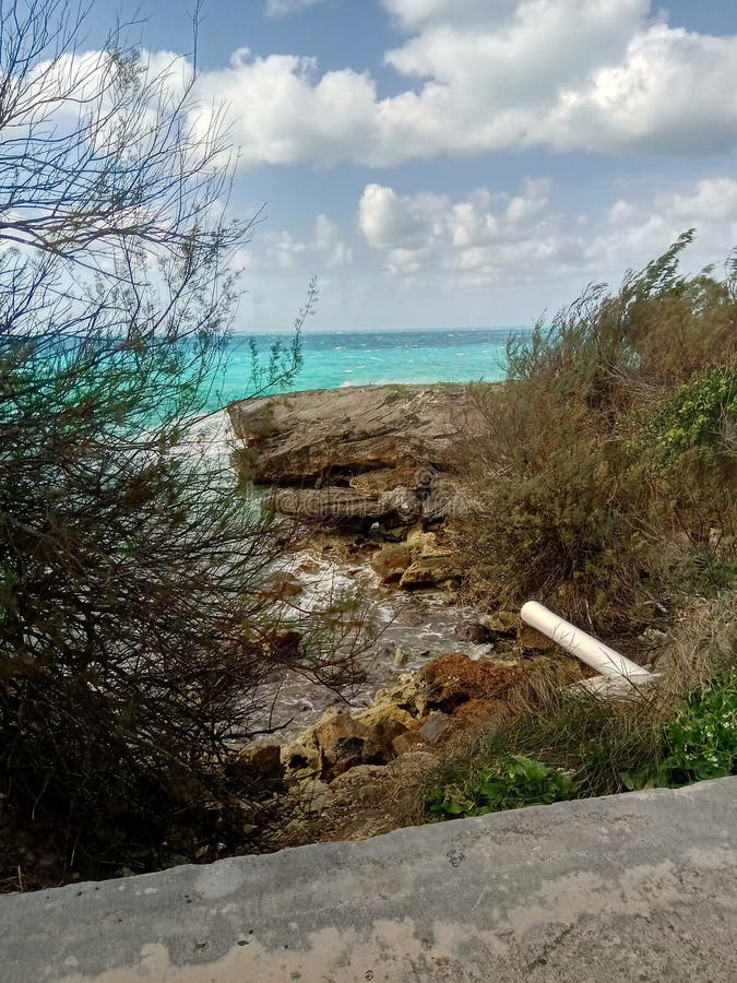 Hidden Sea Wall Pipe White Grey Rock Blue Sky Stock Photos Free