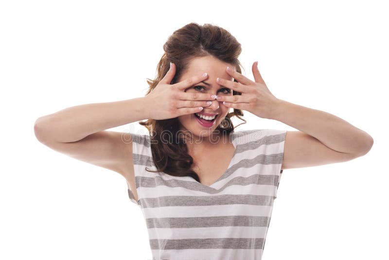 Hiding behind fingers stock photo. Image of human, mouth 36811576