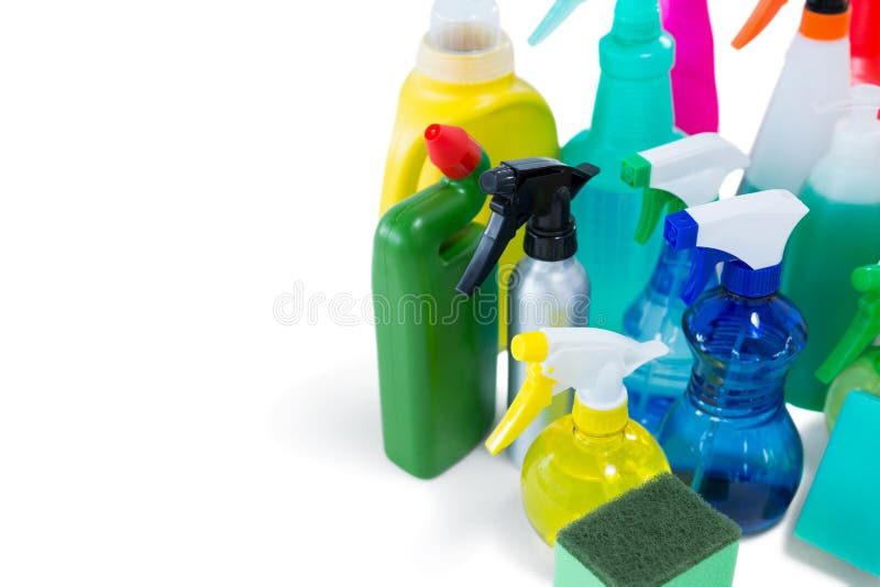 High angel view of colorful spray bottles with sponges and gloves stock images High angel view of colorful spray bottles with sponges and gloves stock images