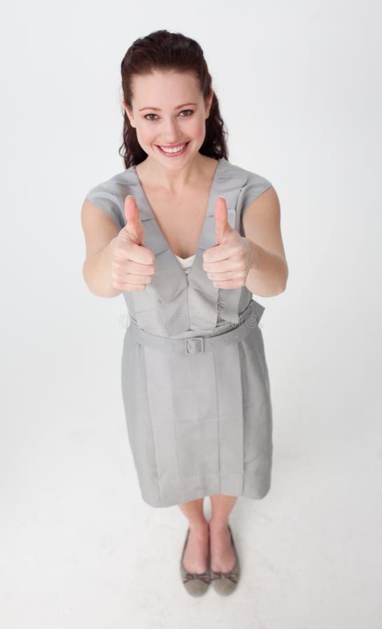 High angle of a businesswoman with thumbs up stock images