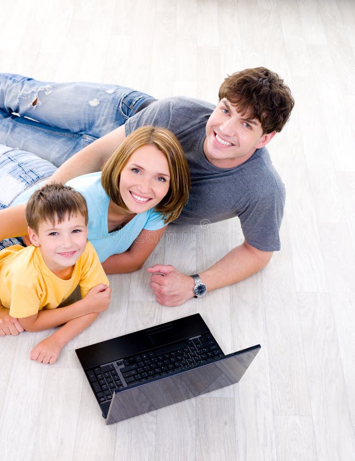 High-angle portait of family with laptop royalty free stock images