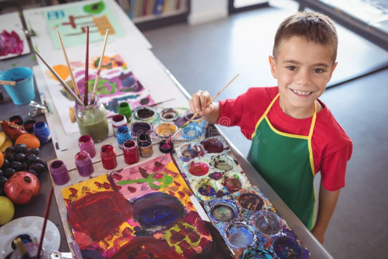 High Angle Portrait of Boy Painting at Desk Stock Photo Image of