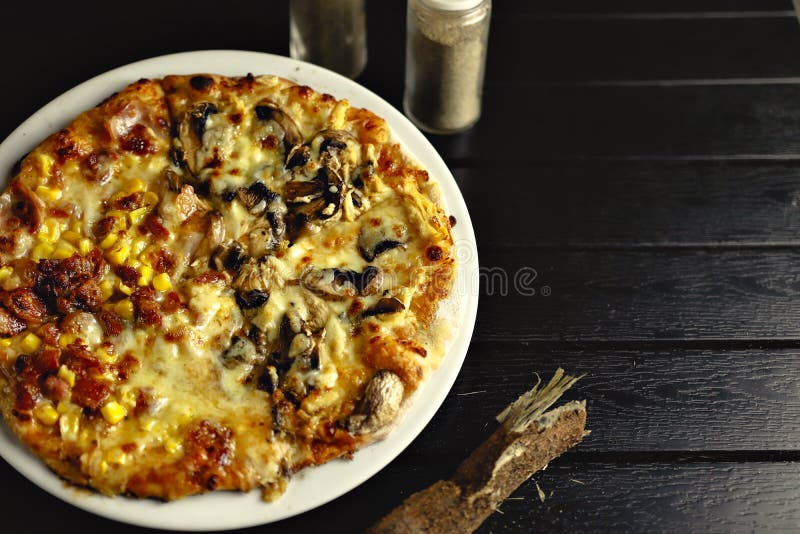 High Angle Shot of a Delicious Pizza with Mushrooms, Melted Cheese