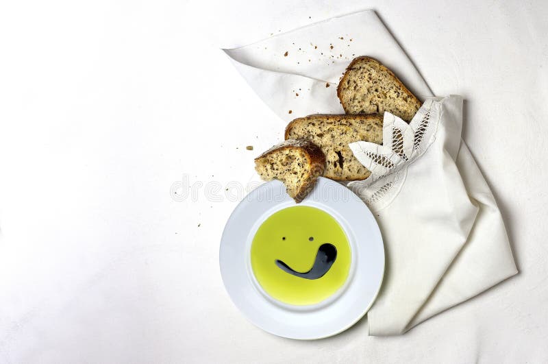 High angle shot of a meal with balsamic vinegar and olive oil on a white background