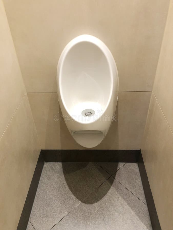 High Angle Shot of a White Urinal in a Bathroom Stock Image Image of