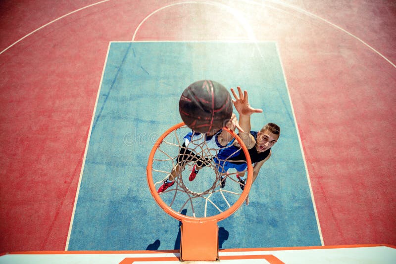 High Angle View of Basketball Player Dunking Basketball in Hoop Stock Image Image of american