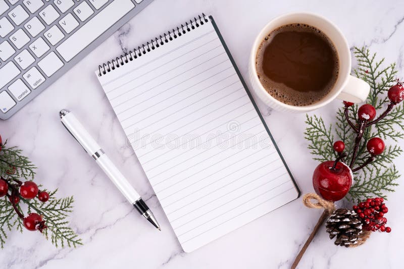 High angle view of blank notepad and cup of mocha stock images