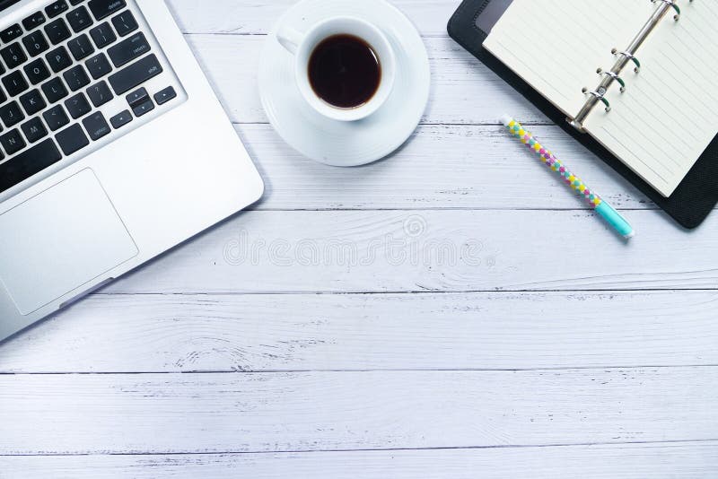 High Angle View of Laptop, Tea and Notepad on Table Stock Image Image