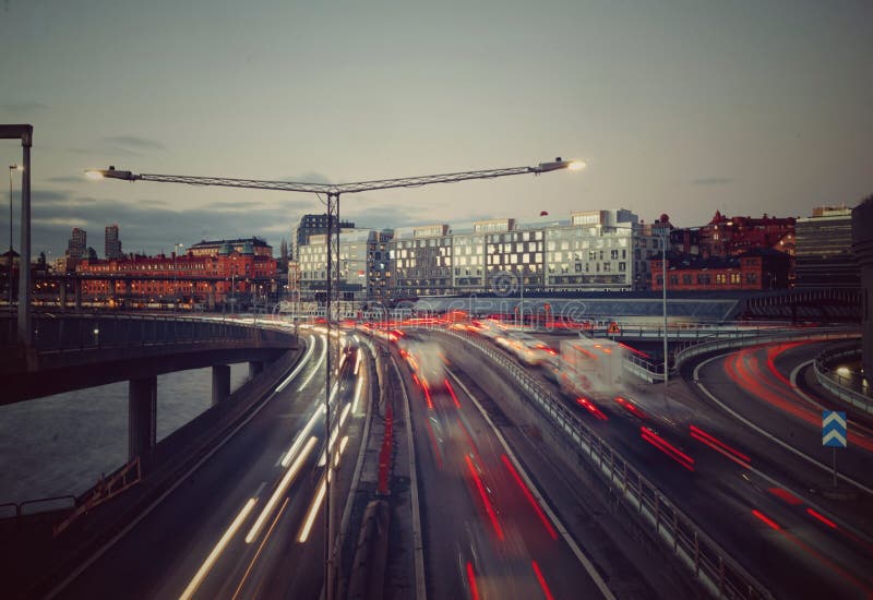 High angle view of light trails on road in city stock photography