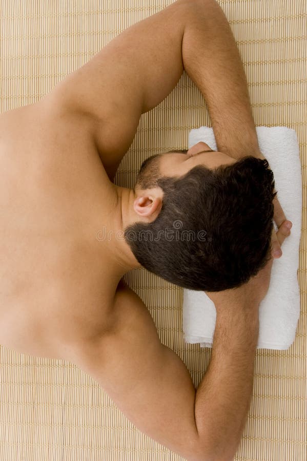 High angle view of man resting in spa resort