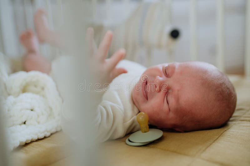 High Angle View of Little Baby in Little Bed. Stock Image Image of