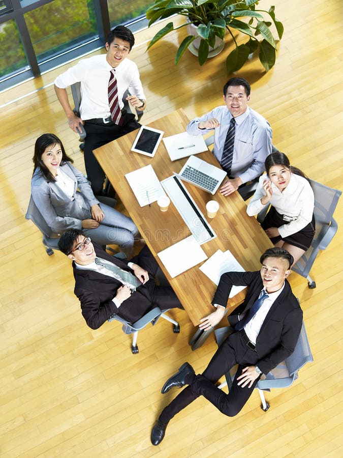 High angle view of a team of asian corporate executives stock photos High angle view of a team of asian corporate executives stock photos