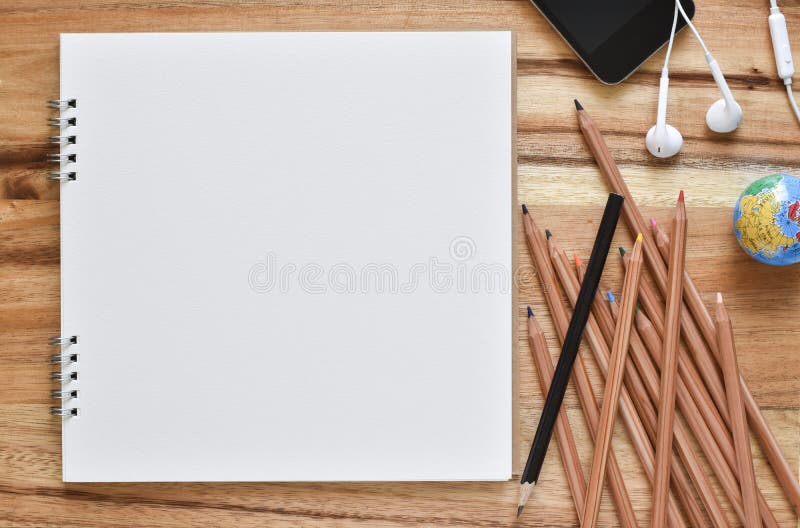 High angle view, White paper for art with colored pencils. stock photo High angle view, White paper for art with colored pencils. stock photo