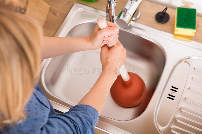 High Angle View of Woman Using Plunger in Sink Stock Image - Image of  housework, difficult: 213854807