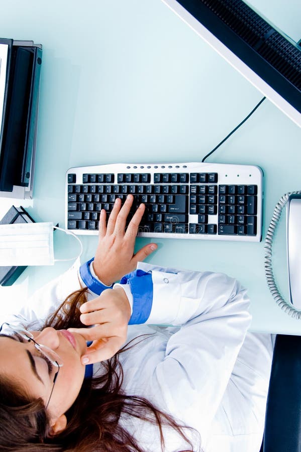 High angle view of working adult doctor stock images