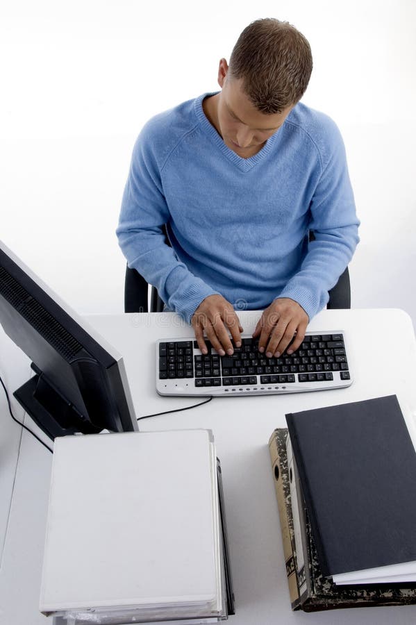 High angle view of working man on computer