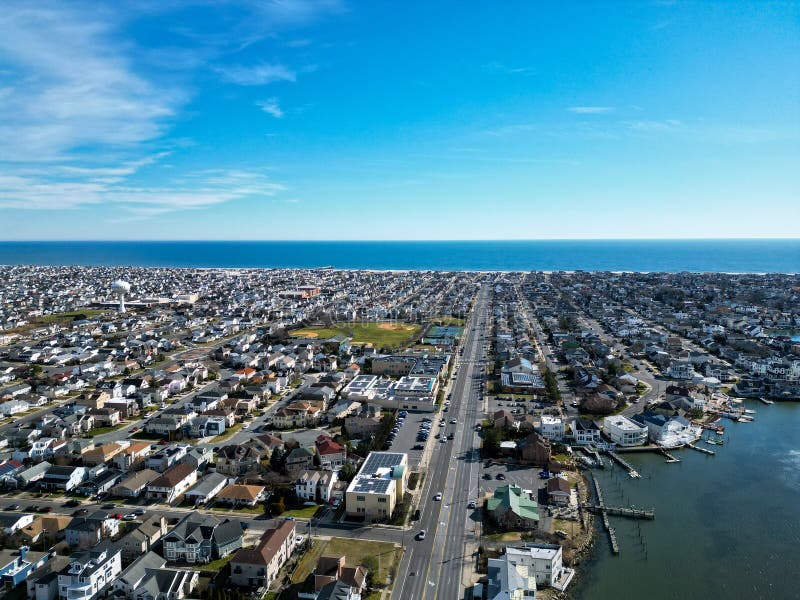 High Drone Aerial View of Densely Populated New Jersey Shore Towns by