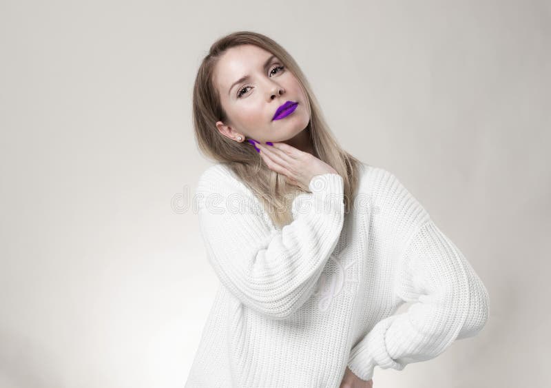 High Fashion model woman with colorful bright lips in studio, portrait of beautiful sexy girl with trendy make-up and stock image High Fashion model woman with colorful bright lips in studio, portrait of beautiful sexy girl with trendy make-up and stock image