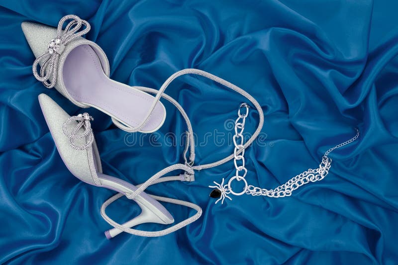 High Heel Shoes on a Blue Background Stock Photo Image of design