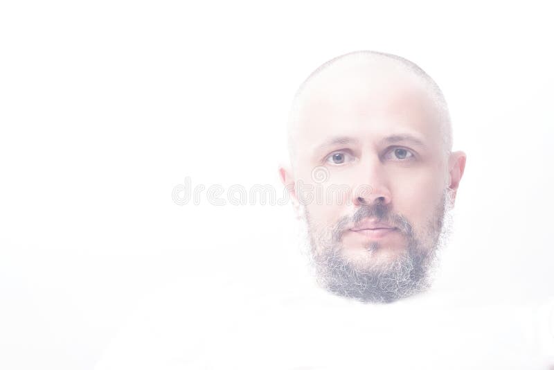 High-key portrait of bald man with grey beard royalty free stock photo