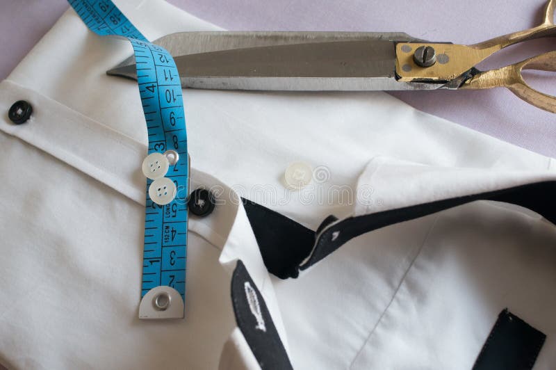 Equipment For Designing Clothes, Measuring Tape, Wooden Scale And Scissors  On Black Fabric Stock Photo, Picture and Royalty Free Image. Image 53653392.