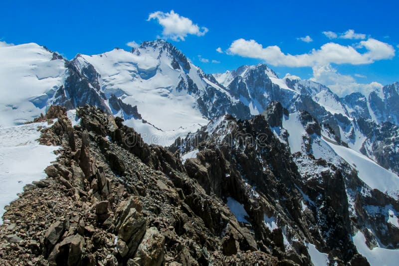 High mountain wall of Tian Shan, snow and glacier ice of Free Korea peak in Ala Archa