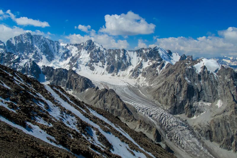 High mountain wall of Tian Shan, snow and glacier ice of Free Korea peak in Ala Archa