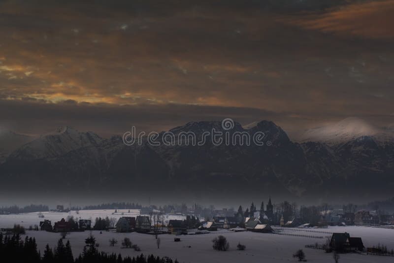 High mountains and city