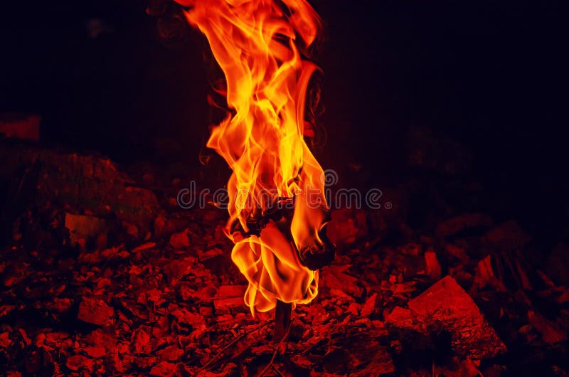 High Pillar of Fire Coming Out of the Stone. Red Fire Burning Flame