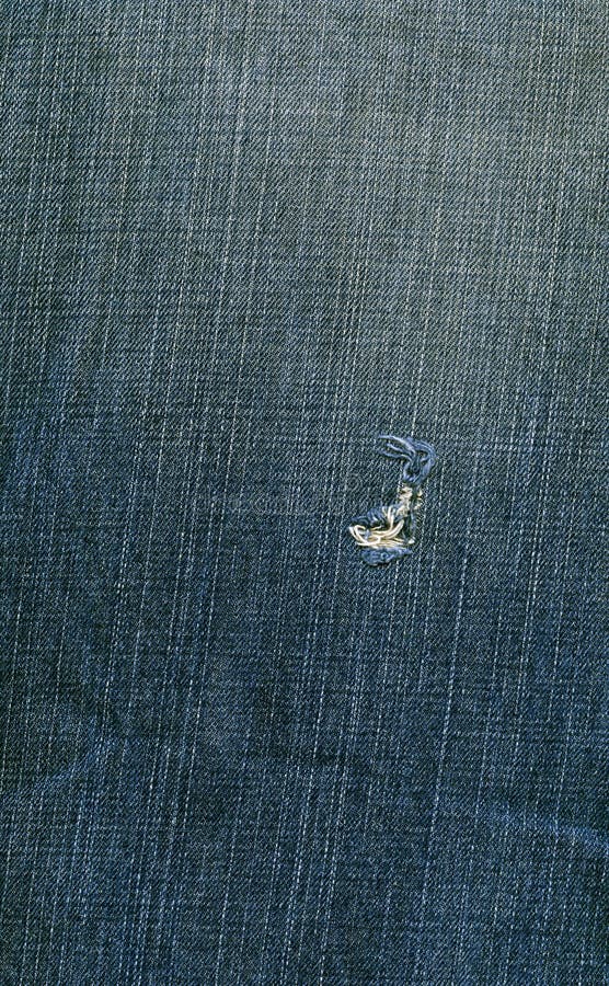 Denim Fabric Texture - Ripped Worn Out Blue royalty free stock images