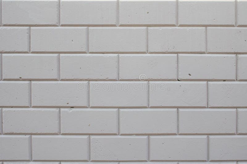 High Resolution Texture of a White Brick Wall. Laying Horizontal Stock