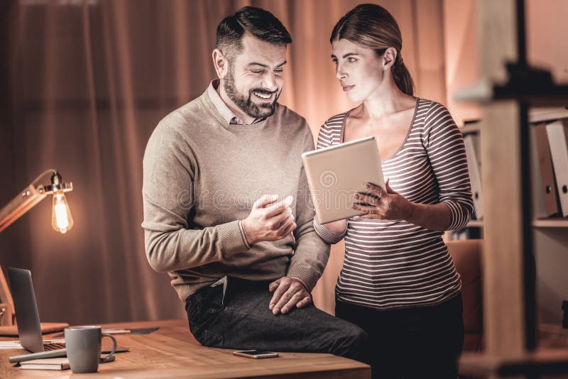 Director and assistant discussing sales royalty free stock photo