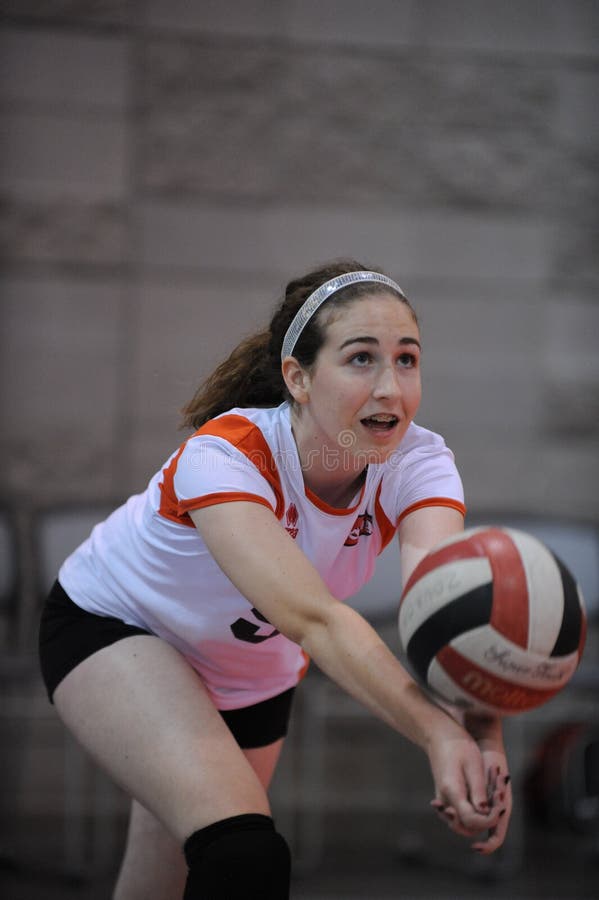 High School Girls Volleyball Action.