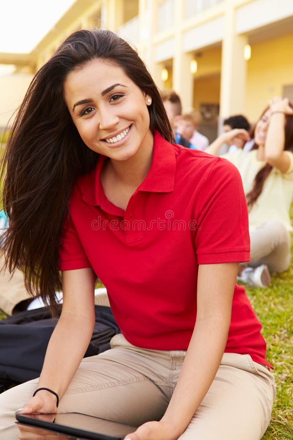 High School Students Studying Outdoors On Campus