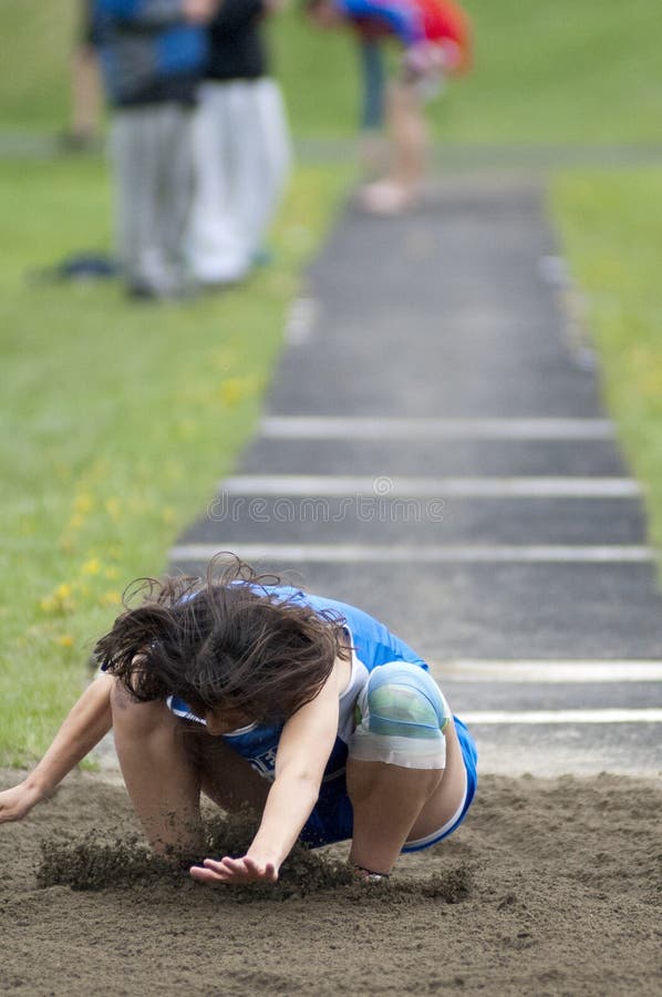 High School Track Long Jump Editorial Photography Image of hair