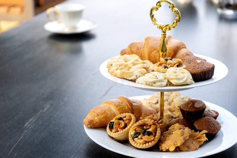 High tea set are on the black table