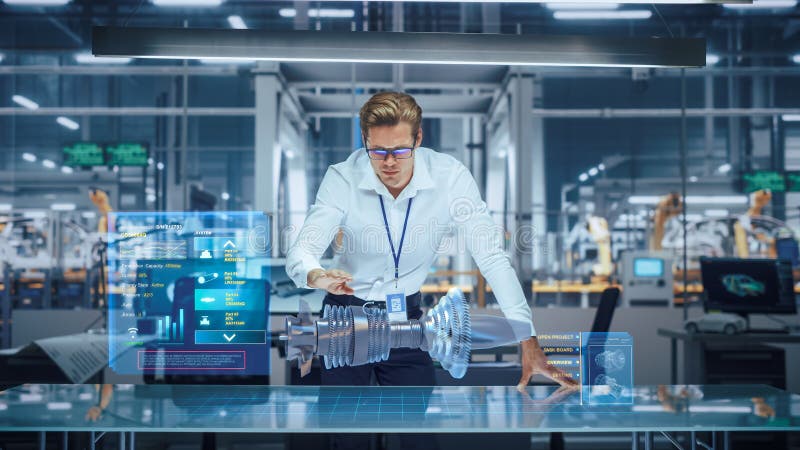 High-Tech Industry: Engineer Designing 3D Engine, Using Augmented Reality Hologram Table to Analys royalty free stock photo