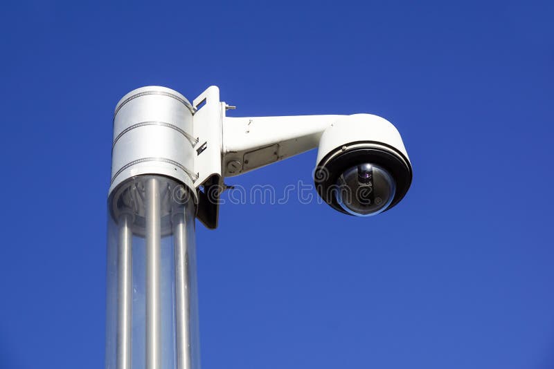High Tech Overhead Security Camera with a Blue Sky Stock Photo Image