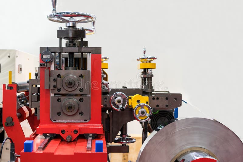 High technology and precision automatic press or forming machine of roll metal sheet for industrial work with copy space. Automatic loading stock images, royalty-free photos and pictures