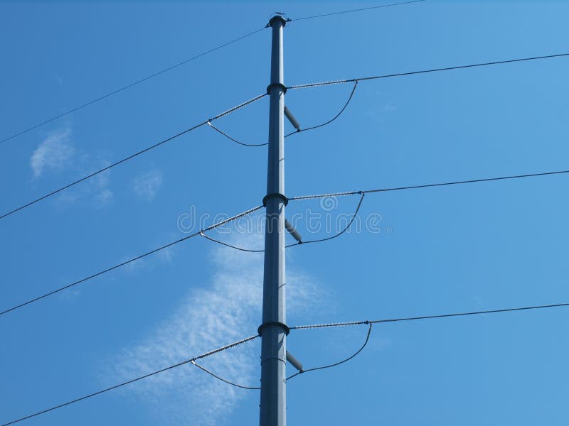 High Tension Wires on a Blue Sky Stock Photo Image of replacing