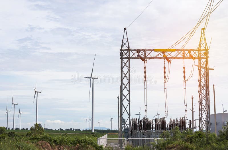 High voltage electrical power pylon substation with wind turbines renewable wind energy stock images High voltage electrical power pylon substation with wind turbines renewable wind energy stock images