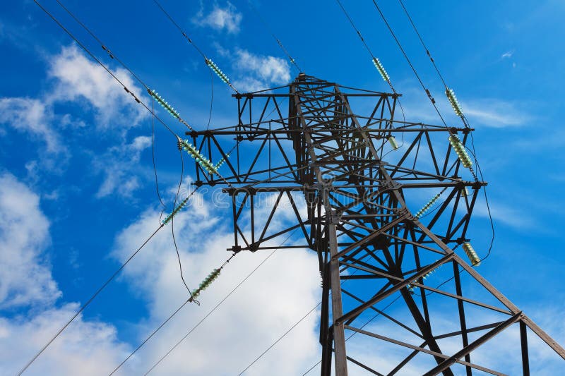High voltage lines and blue sky royalty free stock photography