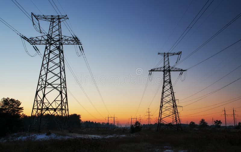 High-voltage power lines during sunrise royalty free stock image High-voltage power lines during sunrise royalty free stock image