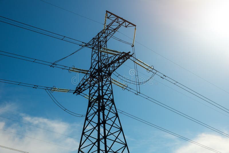 A high voltage power pylons against blue sky stock photography A high voltage power pylons against blue sky stock photography