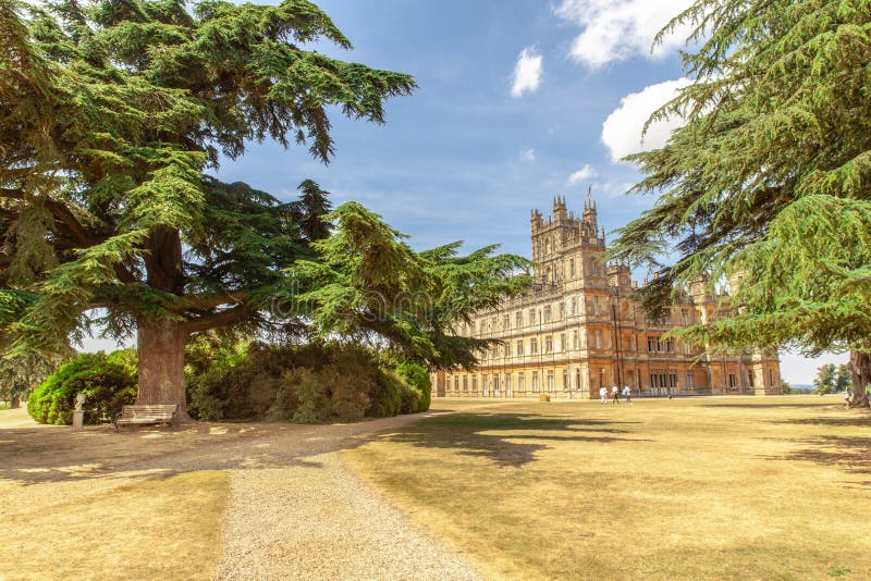 Highclere castle with park and green lebanon cedar Neubury