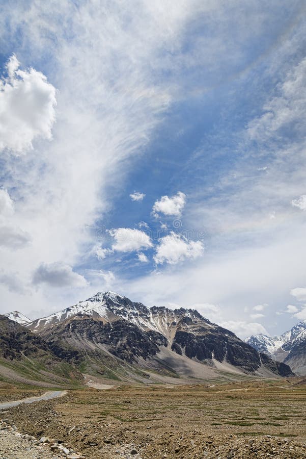 Highlands road and snow capped mountain royalty free stock photos Highlands road and snow capped mountain royalty free stock photos