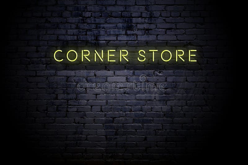 Highlighted Brick Wall with Neon Inscription Corner Store Stock Image