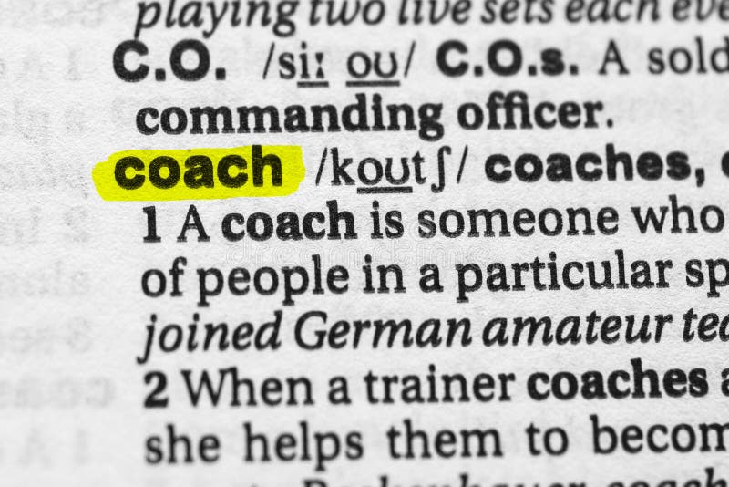 Word Coach Written in Wooden Blocks in Red Notebook on White Woo Stock