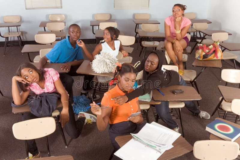 Highschool students messing in class during break