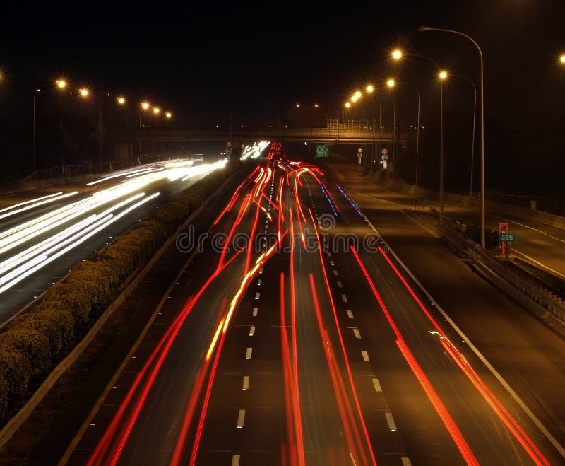 Highway Traffic at Night stock photo. Image of traffic - 18588262